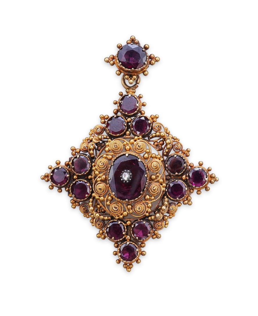 A late Georgian garnet pendant/brooch, 1830s